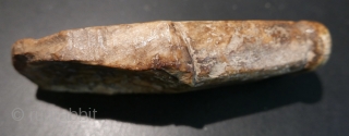 Fossilized walrus tusk fragment fashioned into a 'chopping tool'(adz) by Inuit(Eskimo) people; recovered from village midden on St Lawrence Island in the Bering Sea.  Approximately 4000 years old.  Fantastic patina.  ...