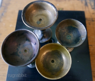 A set of marvelous 19th c Tibetan Buddhist Butter Lamps;  traditionally used in Tibetan Buddhist monasteries and temples in Tibet and elsewhere; an aide to meditation ,  the light 'dispelling  ...