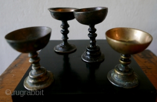 A set of marvelous 19th c Tibetan Buddhist Butter Lamps;  traditionally used in Tibetan Buddhist monasteries and temples in Tibet and elsewhere; an aide to meditation ,  the light 'dispelling  ...