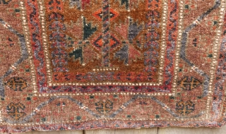 Baluch 'balisht'(complete);  circa 1900;  lustrous wool;  unusual border;  warm,   natural colors;  excellent condition,  and clean. SOLD         