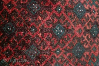 This is a very plush Baluch 'ballsht' with a high and lustrous pile,  blanket-like;  colors - two of aubergine, blue-green,  reddish-orange and white - are deep,  rich and  ...