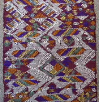 Ceremonial textile for ritual use;  Tai Daeng or Red Tai ethnic group;  Northeastern Laos;  silk and natural dyes;  discontinuous supplementary weft;  1st quarter 20th c.

Mythical animals dominate  ...