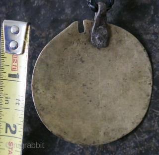 Antique Tibetan 'Melong'; brass and bronze;  18th c.

18th c  Tibetan 'Melong' with Presence and evidence of much ritual use by Bon priests and shamans.  The 'melong' is a symbolic  ...