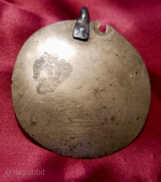 Antique Tibetan 'Melong'; brass and bronze;  18th c.

18th c  Tibetan 'Melong' with Presence and evidence of much ritual use by Bon priests and shamans.  The 'melong' is a symbolic  ...