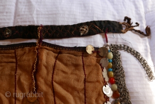 Antique 'niqab' (tribal lady's face covering),  from Palestine.  Have two more,  not quite as good a condition as this.  AND a Bedouin lady's vanity mirror,  not quite  ...