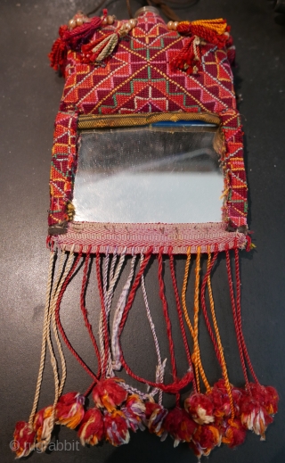 Antique 'niqab' (tribal lady's face covering),  from Palestine.  Have two more,  not quite as good a condition as this.  AND a Bedouin lady's vanity mirror,  not quite  ...