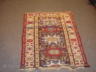 early real antique Lesghi rug.the oldest i ever saw.it was cut but still a great piece for its colours,age,and also for the number of knots it has.top quality weave and wool.a real  ...