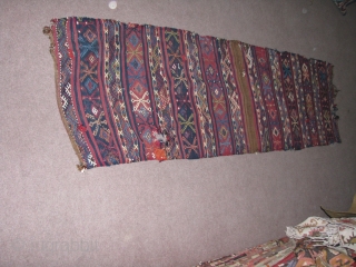 wonderful anatolian kilim.Malatya area.it was used as a grain or storage bag but lately they opened it and was used as a runner.great jijim work.        