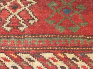 antique unusual shape rug.it is very rare piece.the base is brown and it is either brown sheep wool or camel?all naturel colours.it has nice green and other colours.it had been repaired in  ...