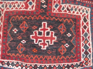 old bakhtyari salt bag .lovely piece with cross design in the centre.it is wool but the white colour is cotton.it has great colours and good condition.it is with soumack work mainly,it has  ...