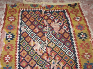 antique(early) rare kilim.19th centry or much earlier.it has a very strong weave and wonderfull colours.the yellow is great as well as all the other colours.all naturel colours.wool but the white is cotton.if  ...