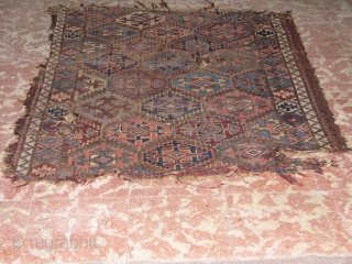unusual antique rug fragment.it has fantastic colours.all naturel.but i dont know what this rug is.if anyone knows please tell me and teach me.i loved the colours and the figures.the piles are worn  ...