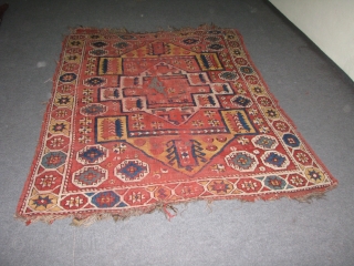 Early Anatolian Rug.Canakkale,Bergama?it is a lovely piece with early colours.great wool.worn out mainly in the middle of the rug and also some holes(damages)but it looks great with the pile parts.the figures are  ...