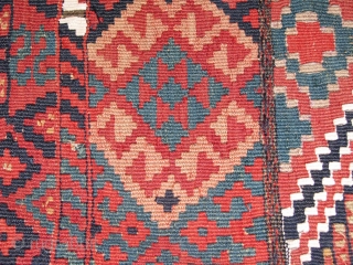 Lovely Kilim.it has great colours,very strong weave.between some panels there are also some extra soumack work.wool but the white weave is cotton.it has a bit stronger colours on the back and you  ...