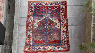 Konya Yürük rug, size 128 x 108
Heavy, long pile. Incredible mix of colors and nuances.
Prayer rug design.
                