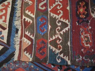 Antique Anatolian kilim, possibly from Aksaray region.
Size: 3,96 x 1,59  Age: Around 1900  
Materials: Wool in warp and wefts, except for all white areas which are in cotton
Technique: Splits covered  ...