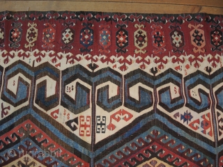 Antique Anatolian kilim, possibly from Aksaray region.
Size: 3,96 x 1,59  Age: Around 1900  
Materials: Wool in warp and wefts, except for all white areas which are in cotton
Technique: Splits covered  ...