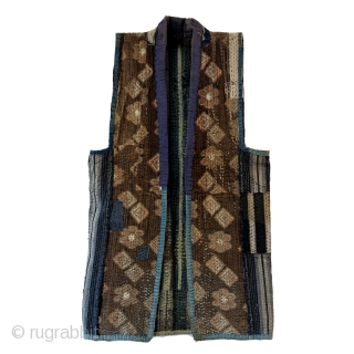 Sashiko Boro Noragi - Sodenashi with Dense Repairs

Extreme sashiko stitching over this vest.

Rustic antique cottons.

Years of use give this sodenashi a very soft feel. 

Suitable for display or wear. 

Early 1900's
Dimensions: 13"  ...