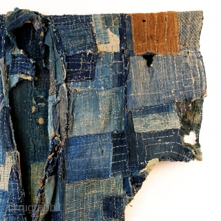 Boro Yogi - Meiji Era Indigo Yogi

An antique heavily worn, repaired and weathered, museum quality boro yogi.

This piece balances a blend of what most collectors seek in boro - a visual aesthetic  ...