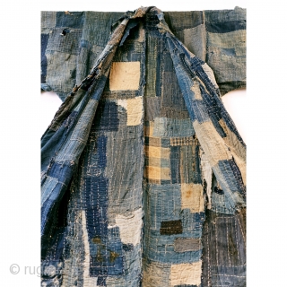 Boro Yogi - Meiji Era Indigo Yogi

An antique heavily worn, repaired and weathered, museum quality boro yogi.

This piece balances a blend of what most collectors seek in boro - a visual aesthetic  ...