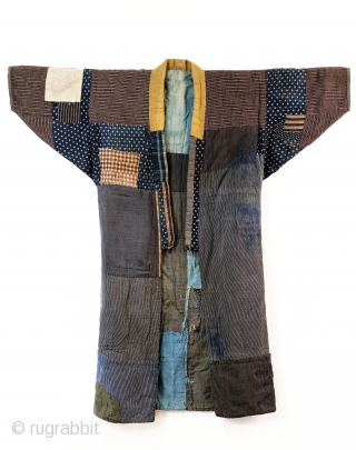 Heavily patched boro noragi displays years of use. 

Outer jacket shows a handsome display of variegated indigo cottons, stripes and checks.

Inner work coat has brilliant yellow sleeves and sashiko stitching.

In excellent overall  ...