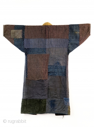 Heavily patched boro noragi displays years of use. 

Outer jacket shows a handsome display of variegated indigo cottons, stripes and checks.

Inner work coat has brilliant yellow sleeves and sashiko stitching.

In excellent overall  ...