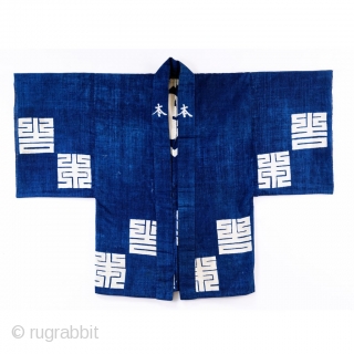 Edo Era Katazome Hanten

Beautiful hand loomed cotton with bold geometric design.

Natural indigo dye with katazome.

Some slight wear to the surface of the garment but nothing that distract from display or wear.

Late 1800's
Dimensions:  ...