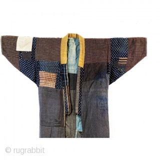 Heavily patched boro noragi displays years of use. 

Outer jacket shows a handsome display of variegated indigo cottons, stripes and checks.

Inner work coat has brilliant yellow sleeves and sashiko stitching.

In excellent overall  ...