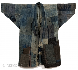 Hand sewn cotton boro﻿ 襤褸 noragi. 

Boro is a Japanese form of recycling coming from an economic necessity in which fabric is patched on the reverse side to preserve the usability.   ...