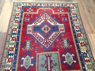 Unique Fahrola Kazak, with rare design and borders.the size 4x4'11 ( 122x150 cm)                    