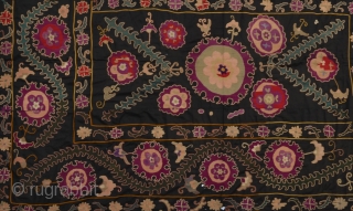 Antique Uzbek Suzani
An early rich Uzbek Suzani with beautiful silk medallions and floral themes on cotton background.
102" x 69"              