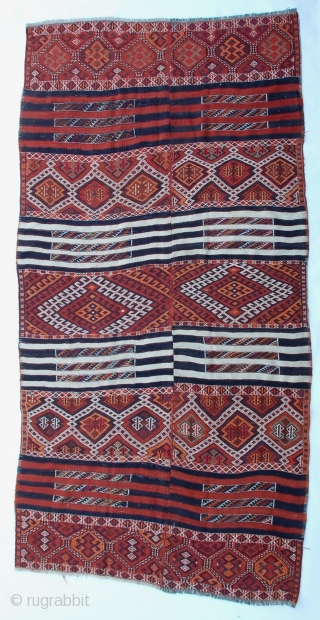 Large Kurdish kilim two panel woven with intricate Soumak weaving from SE Turkey.
130" x 67"                  