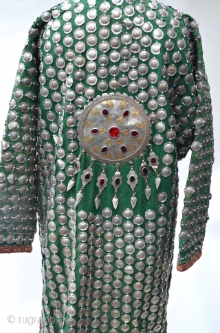 Turkestan Green Silver Medallions Wedding Coat covered front and back with hand stamped silver metal medallions and held together by silver carnelian pendants.          