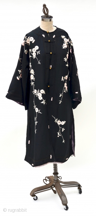 Chinese Silk Embroidered Turn of the Century Embroidered Robe
embroidered pink blossoms on black silk robe with brass frog buttons, wide cut bracelet length sleeves and side slits, made for the western market  ...