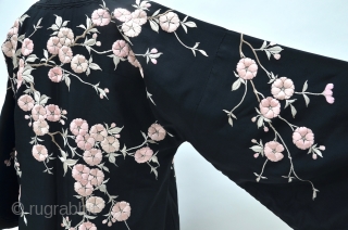 Chinese Silk Embroidered Turn of the Century Embroidered Robe
embroidered pink blossoms on black silk robe with brass frog buttons, wide cut bracelet length sleeves and side slits, made for the western market  ...