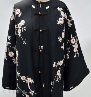 Chinese Silk Embroidered Turn of the Century Embroidered Robe
embroidered pink blossoms on black silk robe with brass frog buttons, wide cut bracelet length sleeves and side slits, made for the western market  ...