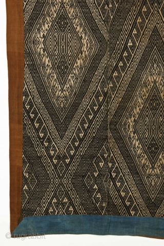 A woven indigo bed cover (Xam Nuea ceremonial blanket), natural dyed cotton, supplementary weave, c. 1900.

33'' x 63'' (84 x 160 cm)           