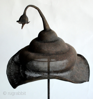 Sumbawa, Indonesia Ceremonial Copper Wire Hat, hand plaited fine copper wire woven hat used in ritual ceremonies.
12"H                