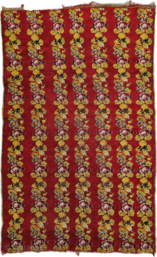 Discovering a masterpiece from the late 1800s: A stunning Kırşehir kilim, a true testament to the skill and artistry of Anatolian weaving.
​Looking at these vibrant, detailed rows of woven flowers, I can  ...