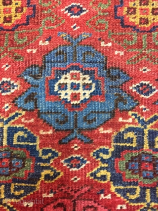 Good Kurdish long rug woven on a wool foundation, Bijar area north west Persia,last quarter 19th ,century,8ft.2in.x4ft.1in.2.49cm.x1.25cm.overall wear with corrosion to Browns,losses to both ends.unusual all over design of rosettes in a  ...