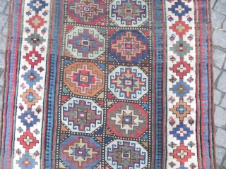 An Exceptional and colorful Antique Caucasian Moghan Kazak Runner, 4.1 x 13.1 ft (125x400 cm), mid 19th Century. my favourite here is the apricot..         