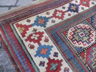 An Exceptional and colorful Antique Caucasian Moghan Kazak Runner, 4.1 x 13.1 ft (125x400 cm), mid 19th Century. my favourite here is the apricot..         