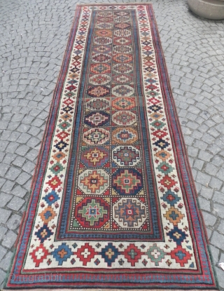 An Exceptional and colorful Antique Caucasian Moghan Kazak Runner, 4.1 x 13.1 ft (125x400 cm), mid 19th Century. my favourite here is the apricot..         