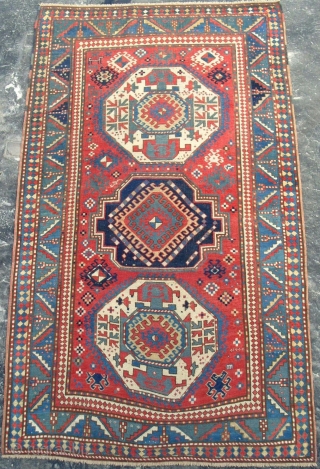 Antique Caucasian Triple Medallion Kazak Rug ( Lori Pambak ), 150x252 cm (4'11" x 8'3"). Splendid colours, good age and condition with no issues and generous size. www.rugspecialist.com     