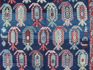 A Caucasian Kuba Long Rug with lots of botehs on a beautiful blue ground, ca 1900, very good condition, all original, 108x46 inches (273x116 cm). www.rugspecialist.com       