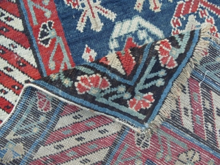 A Caucasian Kuba Long Rug with lots of botehs on a beautiful blue ground, ca 1900, very good condition, all original, 108x46 inches (273x116 cm). www.rugspecialist.com       