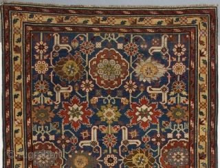 Afshan Kuba long rug from NE Caucasus, 4.3 x 10 Ft (128x298 cm), ca 1800. Provenance: a private collection in England.            