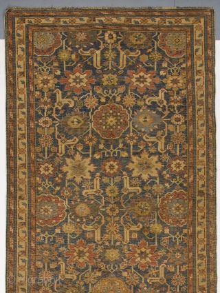 Afshan Kuba long rug from NE Caucasus, 4.3 x 10 Ft (128x298 cm), ca 1800. Provenance: a private collection in England.            