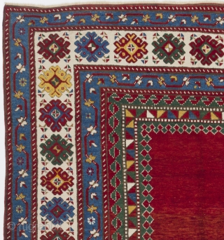 A top notch antique kazak rug with an eye catching plain red field, South Caucasus, ca 1890, 175x282 cm, very good condition, full pile, all original as found. Deep washed professionally.  