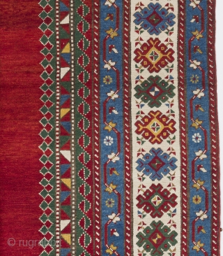 A top notch antique kazak rug with an eye catching plain red field, South Caucasus, ca 1890, 175x282 cm, very good condition, full pile, all original as found. Deep washed professionally.  